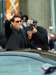 Tom Cruise arrives in the Bugatti Veyron