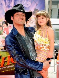 Robert Rodriguez and daughter Rhiannon step out at the premiere of the director’s ‘Shorts’ in Hollywood on August 15, 2009