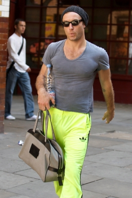 Jude Law spotted rocking day glow track pants on his way to the matinee performance of Hamlet at Wyndhams Theatre on August 19, 2009 in London
