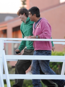 Ashton Kutcher and George Lopez pal around in Venice Beach on August 27, 2009