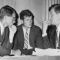 American politician brothers, US attorney-general Robert Kennedy (1925 - 1968), US senator Edward ‘Ted’ Kennedy, and US president John F. Kennedy (1917 - 1963) speak while seated behind a desk, circa 1962