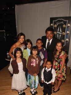 Eva Longoria Parker and George Lopez with the Children of Padres Contra El Cancer at the organization’s 9th Annual Fund Raising Gala, ‘El Sueno De Esperanza’ on September 10, 2009