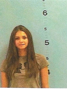 Nina Dobrev from ‘The Vampire Diaries’ is shown in her mugshot after being arrested and charged with disorderly conduct in Forsyth, GA, Aug. 2009
