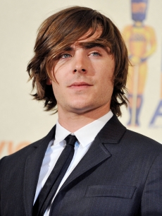 Zac Efron poses at the 2009 MTV Movie Awards Press Room at Gibson Amphitheatre on May 31, 2009 in Universal City, California