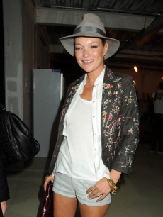 Kate Moss attends the Unique Fashion Show during London Fashion Week on September 20, 2009