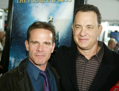 Actors Peter Scolari and Tom Hanks arrive at the premiere of ‘Polar Express’ and the Grauman’s Chinese Theatre on November 7, 2004 in Hollywood, California