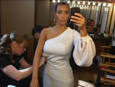 Kim Kardsahian tweets, ‘Almost done sewing Kourtney had 2 go live without me 2 start! HURRY HURRY!!!!!’