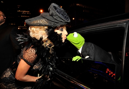 Lady Gaga and Kermit the Frog share a kiss at the 2009 MTV Video Music Awards at Radio City Music Hall on September 13, 2009 in New York City