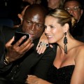 Seal and Heidi Klum take their photo with an iPhone during the Emmy Awards, Los Angeles, Sept. 20, 2009