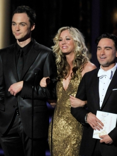 Jim Parsons, Kaley Cuoco, and Johnny Galecki present the Outstanding Directing/Writing for a Variety, Music, or Comedy Series awards onstage during the 61st Primetime Emmy Awards held at the Nokia Theatre, LA, September 20, 2009