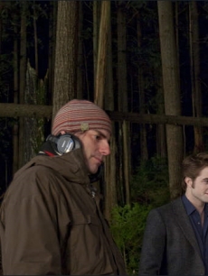 ‘New Moon’ Director Chris Weitz and a smiling Robert Pattinson on the set just outside Vancouver on April 24, 2009 