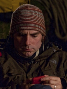 Director Chris Weitz checks his phone while on the set of ‘New Moon,’ on April 24, 2009