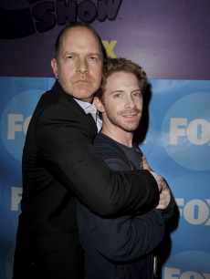 ‘The Cleveland Show’ Executive Producer Mike Henry and Seth Green embrace for photographers at the premiere party for their show, Los Angeles on September 22, 2009