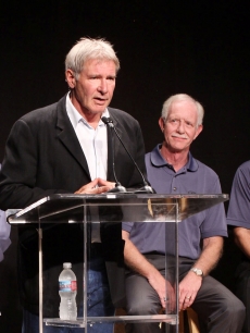 Harrison Ford introduces hero pilot ‘Sully’ Sullenberger, his replacement as EAA Young Eagles Chairman, in Santa Monica, California on September 29, 2009