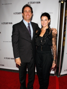Jerry Seinfeld and wife Jessica Seinfeld pose for photographers at the ‘A Steady Rain’ Broadway opening night in New York City on September 29, 2009