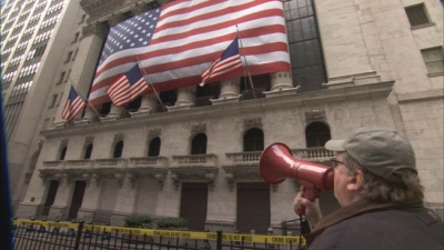 The Buck Stops Here!  Michael Moore takes on Wall Street in “Capitalism: A Love Story”