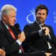 Former President Bill Clinton and Brad Pitt share the stage at the 2009 Clinton Global Initiative in New York City on September 24, 2009
