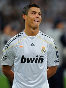 Soccer superstar Cristiano Ronaldo smiles before the Real Madrid vs. Marseille match in Madrid, Spain on September 30, 2009