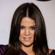 Khloe Kardashian smiles at the Famous Cupcakes launch party in Los Angeles on October 7, 2009