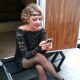 Melissa Joan Hart, hard at work blogging for Access Hollywood