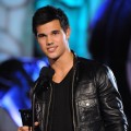 Taylor Lautner smiles on stage at Spike TV’s Scream 2009 at the Greek Theatre in Los Angeles on October 17, 2009