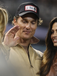 Matthew McConaughey and girlfriend Camila Alves look on during Game One of the 2009 MLB World Series at Yankee Stadium on October 28, 2009