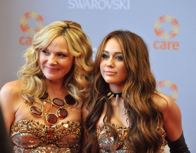 Kim Cattrall and Miley Cyrus on the set of ‘Sex and the City 2’ in New York City on October 16, 2009
