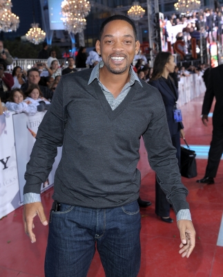 Will Smith smiles before heading into the premiere of ‘This Is It,’ Los Angeles, Oct. 27, 2009