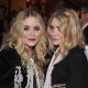 Mary-Kate Olsen and Ashley Olsen attend the new member induction to The Council Of Fashion Designers of America (CFDA) at the Four Seasons Restaurant on October 21, 2009 in New York City