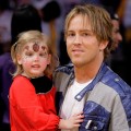 Larry Birkhead and daughter Dannielynn Birkhead attend a game between the New Orleans Hornets and the Los Angeles Lakers at Staples Center on November 8, 2009 in Los Angeles, California