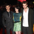 Taylor Lautner, Kristen Stewart and Robert Pattinson all pose together at a ‘Twilight Saga: New Moon’ fan event in London, England on November 11, 2009