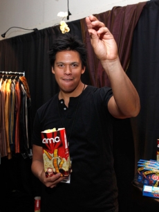 Chaske Spencer gets his popcorn arm ready with AMC Theatres for the premiere of ‘New Moon’