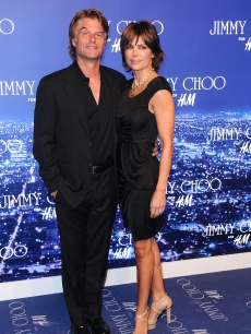 Actor Harry Hamlin & actress Lisa Rinna arrive at the Jimmy Choo for H&M Collection private event in support of the Motion Picture & Television Fund on November 2, 2009 in West Hollywood, California.