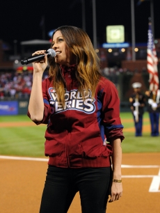 Alanis Morissette sings the National Anthem prior to Game 5 of the World Series between the Yankees and the Phillies at Citizens Bank Park in Philadelphia on November 2, 2009