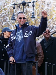 New York Yankees shortstop Derek Jeter, Minka Kelly and Jeter’s father, S. Charles Jeter attend 2009 New York Yankees World Series Victory Parade, NYC, November 6, 2009