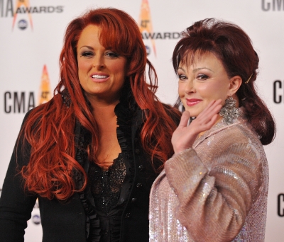 Wynonna Judd and Naomi Judd of The Judds arrive at the 43rd Annual CMA Awards at the Sommet Center on November 11, 2009 in Nashville, Tennessee