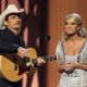 Brad Paisley and Carrie Underwood sing about the Kayne West VMA stage invasion during the opening monologue at the CMAs, Nashville, Nov. 11, 2009