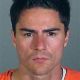 Edis Kayalar, who has been charged with trying to extort $100,000 from Cindy Crawford and Rande Gerber, is pictured in a photo provided by the Department of Justice, Nov. 12, 2009