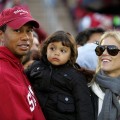 Tiger Woods, Sam Woods and Elin Nordegren look on at the Stanford-Cal game on November 21, 2009