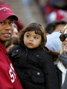 Tiger Woods, Sam Woods and Elin Nordegren look on at the Stanford-Cal game on November 21, 2009