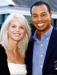 Elin Nordegren and Tiger Woods pose in September 2006