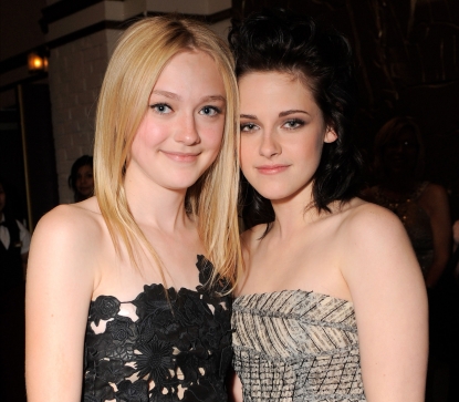 Dakota Fanning and Kristen Stewart at the premiere of Summit Entertainment’s ‘The Twilight Saga: New Moon’ on November 16, 2009 in Westwood, California