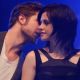 Robert Pattinson and Kristen Stewart get close on stage at the Olympic Hall in Munich, Germany on November 14, 2009