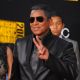 Jermaine Jackson flashes the peace sign at the 2009 American Music Awards at the Nokia Theatre L.A. Live in LA on November 22, 2009