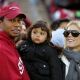 Tiger Woods, Sam Woods and Elin Nordegren look on at the Stanford-Cal game on November 21, 2009
