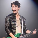 Nick Jonas of Jonas Brothers rocks the Pepsi Center on June 24, 2009 in Denver, Colorado