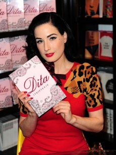 Dita Von Teese signs her latest book, ‘Dita - Striptease,’ in Miami Beach on December 4, 2009