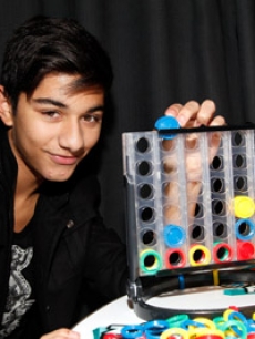 Mark Indelicato of ‘Ugly Betty’ had fun playing Hasbro Family Game Night’s new Connect 4x4 backstage, and admitted to already having a game closet full of Hasbro games!