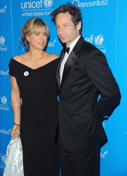 Tea Leoni and David Duchovny look happy together at the 2009 UNICEF Snowflake Ball at Cipriani 42nd Street in NYC on December 2, 2009