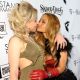 Casey Johnson and Tila Tequila share a smooch while showing off Tila’s engagement ring at Snoop Dogg’s release party for ‘Malice N Wonderland’ at Vanguard on December 8, 2009 in Hollywood, California